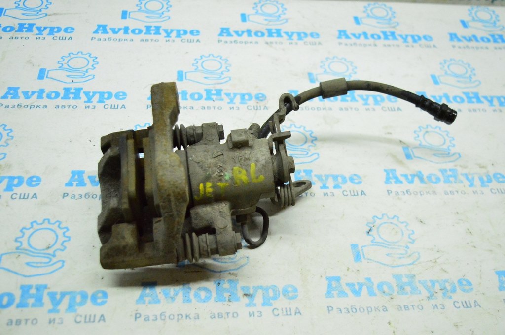 Суппорт зад лев VW Jetta 11-18 USA